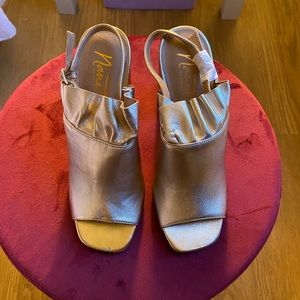 Gold Nanette Lepore chunky sandals.